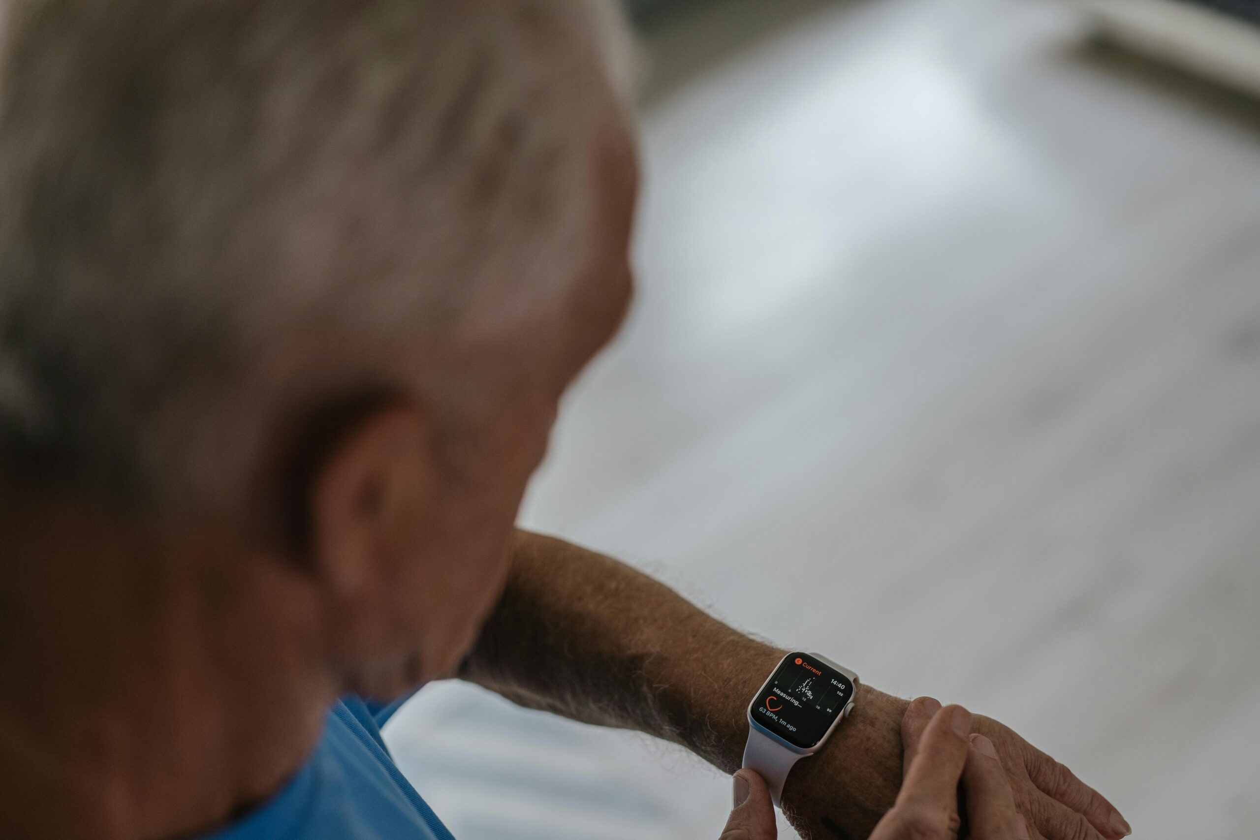 Senior with health tracking watch